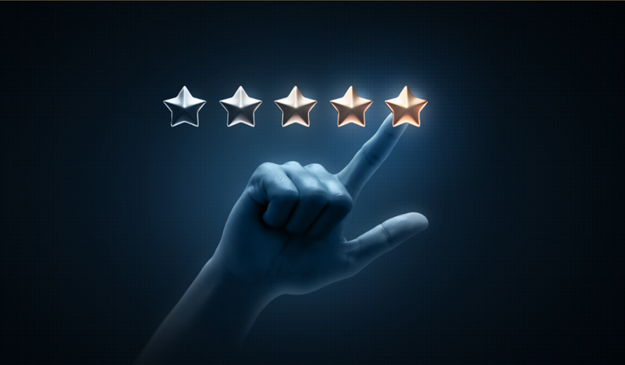 A graphic displaying five stars with a finger pointing to the brightest star, reflecting the ambition to be a premium brand